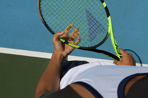 What are polyester strings and who are they designed for?